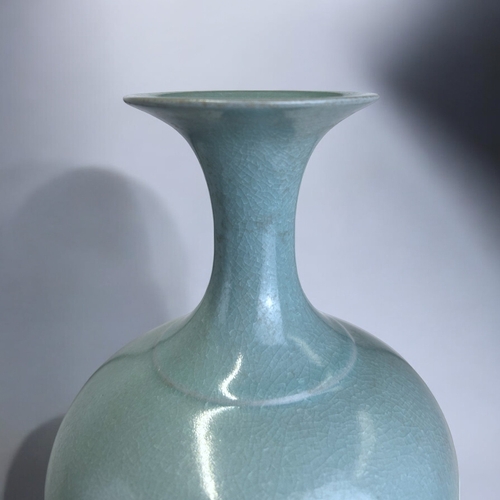 1 - A Chinese monochrome 'Ru type' pottery vase.With crackle, 'sky blue' glaze. 19thcIn the Song, Ru war... 