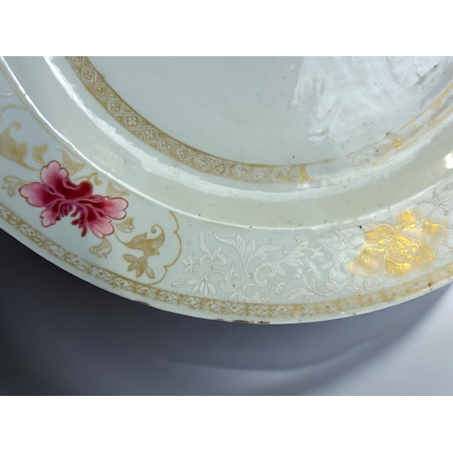 15 - A large Chinese export porcelain 'Bianco Sopra Bionco' Famille rose charger.Hand painted overglaze e... 