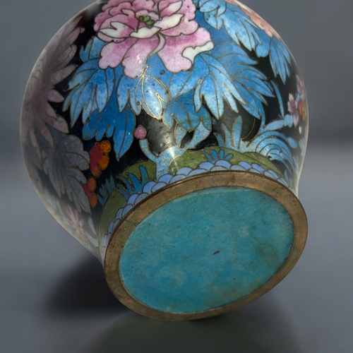 9 - A Chinese Cloisonné lidded jar.Qing dynasty.Squat form, intricately decorated with polychrome... 