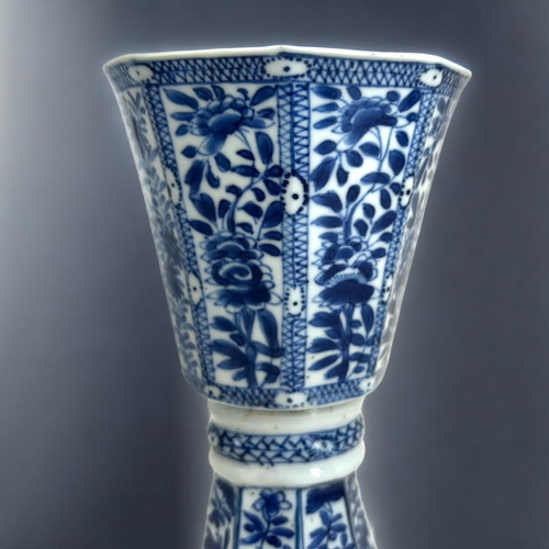 24 - A Chinese blue & white porcelain stem cup.Kangxi period, (1662-1722)Raised on high foot, with oc... 