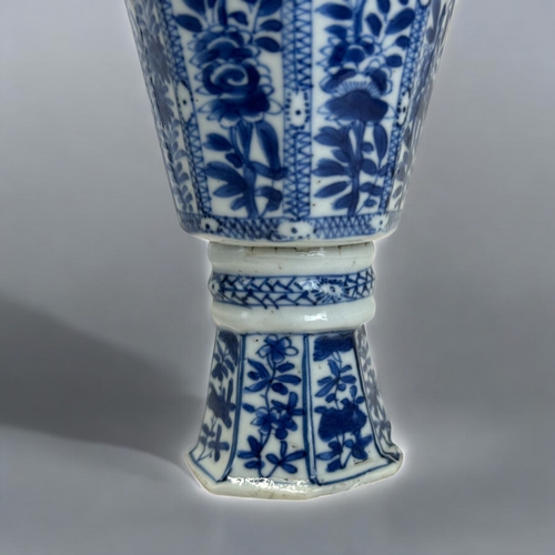 24 - A Chinese blue & white porcelain stem cup.Kangxi period, (1662-1722)Raised on high foot, with oc... 