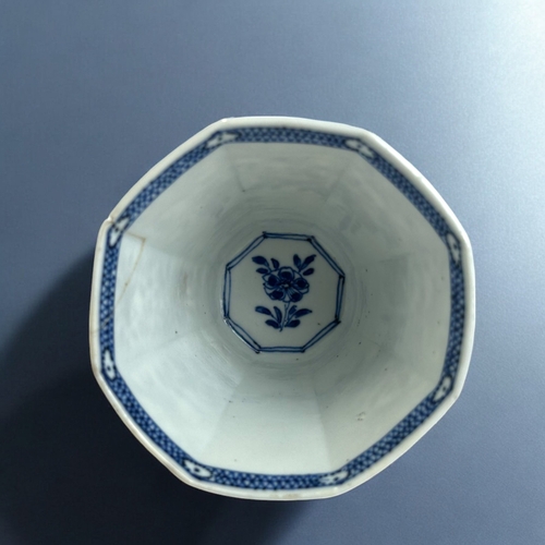 24 - A Chinese blue & white porcelain stem cup.Kangxi period, (1662-1722)Raised on high foot, with oc... 