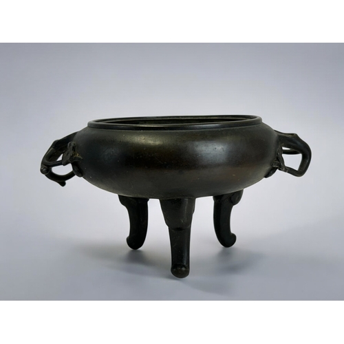 13 - A Japanese bronze tripod censer.Meiji period, 19th century.Raised on three feet, with Cherry blossom... 