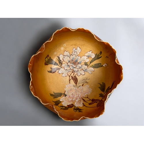 27 - A Japanese Satsuma bowl.Meiji period, decorated with various insects.Together with a pair of Satsuma... 