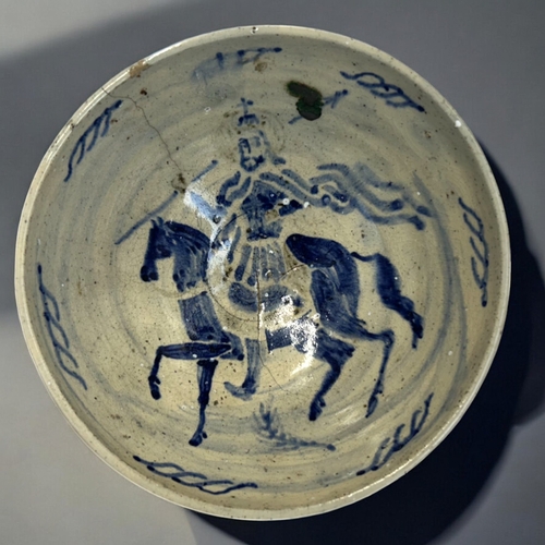 595 - Antique Persian glazed bowl.Possibly Safavid. Painted warrior on horseback. Faded script to exterior... 