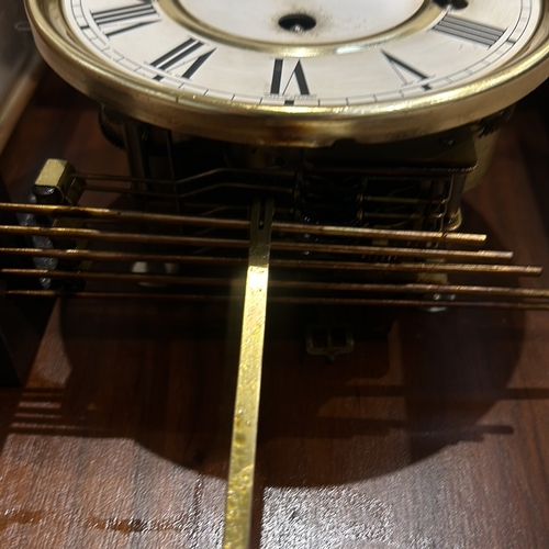 278 - Mid-Century Modern mechanical clock with brass and wood casing. Features classic Roman numeral dial ... 