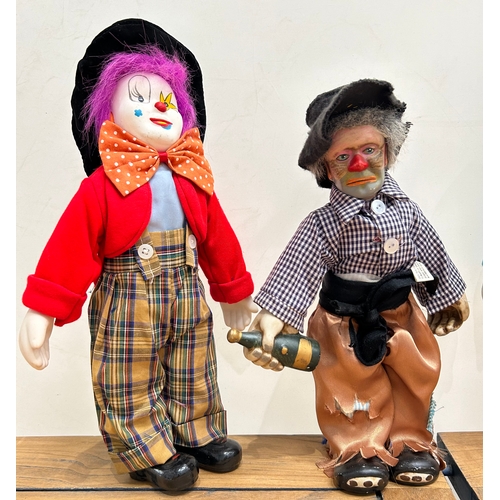 289 - A collection of 5 Large clowns with hand painted porcelain heads, hands and feet