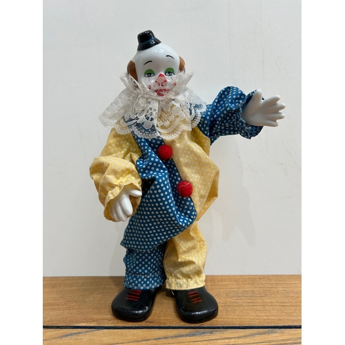 289 - A collection of 5 Large clowns with hand painted porcelain heads, hands and feet