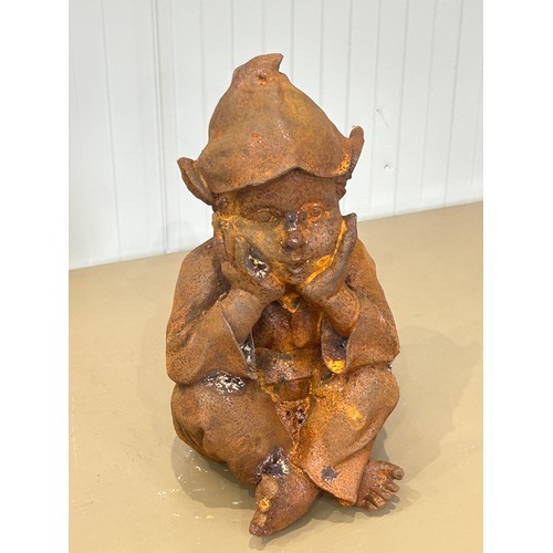 325 - A Large Heavy cast iron garden elf Seated statue