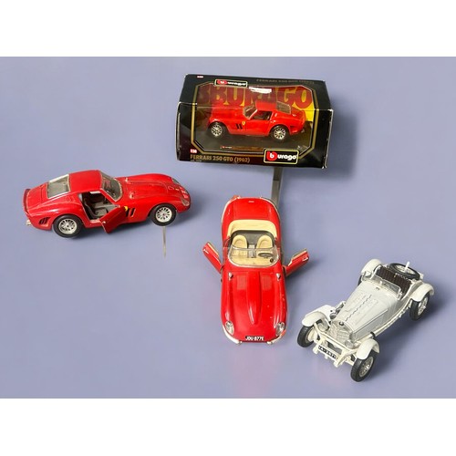 313 - A Burago Ferrari 250 GTO 1;24 New in box, with 3 1:18 Burago models including Ferrari GTO , Jaguar E... 