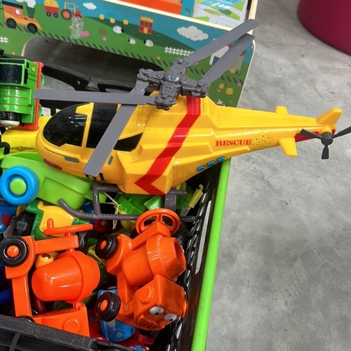 316 - A Large Collection of colorful toys, including helicopters, trains, and vehicles. Assorted designs. ... 