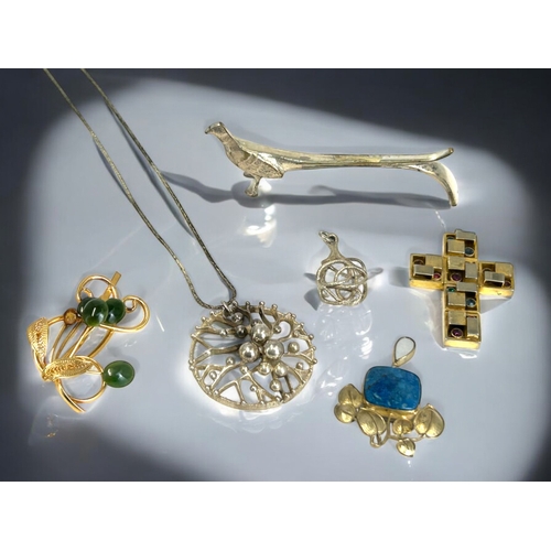 500 - A miscellaneous collection of ladies jewellery.Including a large silver 'berry' pendant & neckla... 