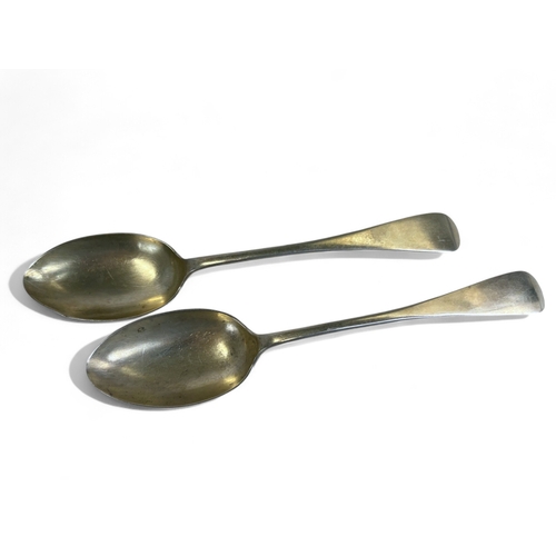 557 - A boxed set of Harrods Solid Hallmarked Silver Teaspoons. Together with Two Large John Round & S... 