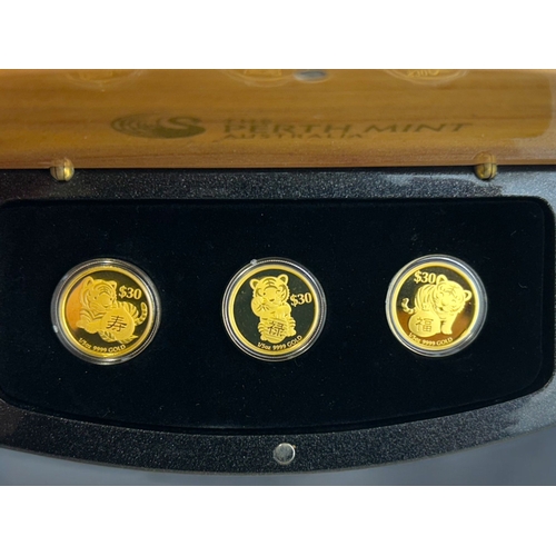 478 - Ltd edition boxed 24ct gold three coin proof set.2010 Year of the Tiger. Each coin depicts a Tiger c... 