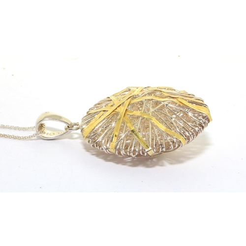 244 - 925 silver pendant necklace in a star thatched design 