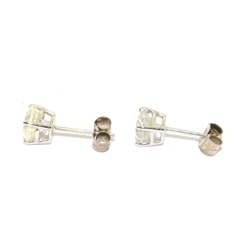 348 - Pair of clear 14ct white gold Diamond stud earrings of approx 1.65cts