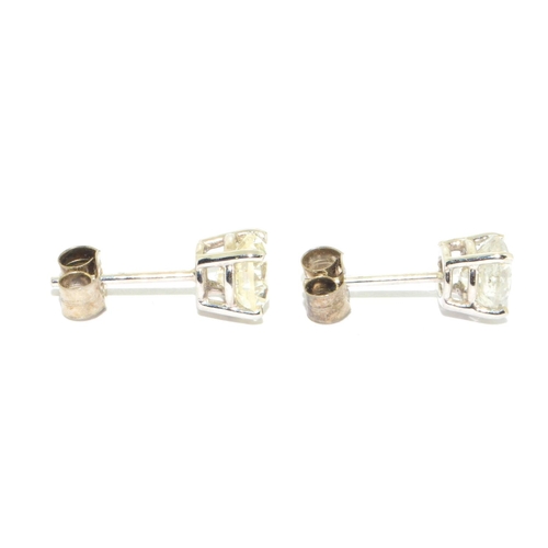 348 - Pair of clear 14ct white gold Diamond stud earrings of approx 1.65cts