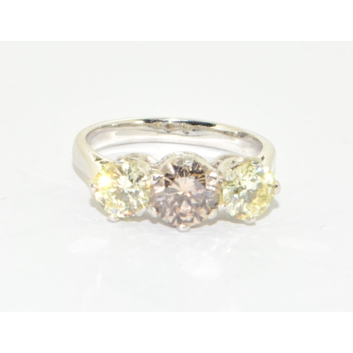 341 - Unusual 18ct three stone diamond ring with the centre stone being cognac and total of approx 2cts si... 