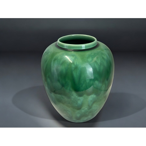 42 - Large Green glaze Poole pottery vase.Height - 22cm