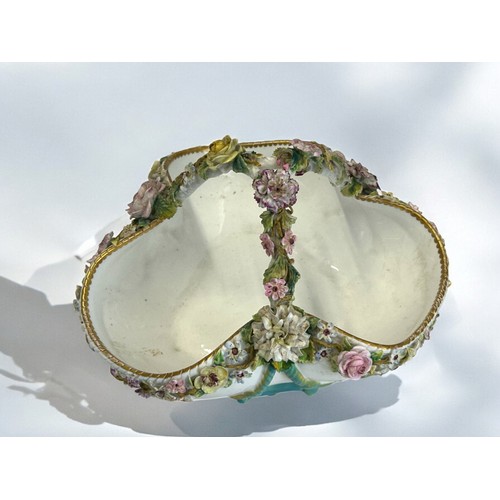 298 - A 19th century John Bevington porcelain basket.Hand painted encrusted flowers. 16 x 22cm