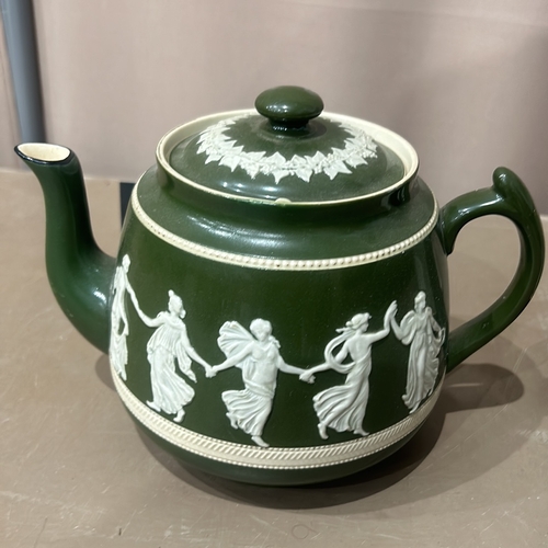 201 - Antique Green Jasperware carltonware teapot and jug set, featuring classical relief design. Marked 