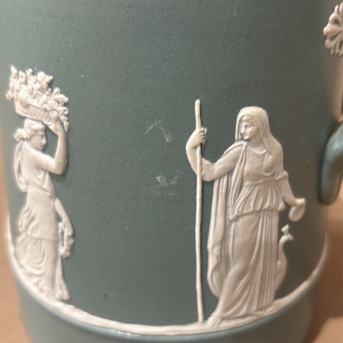 203 - Antique Wedgwood Style Jasperware jug features classical figures in blue with white relief. It is ma... 