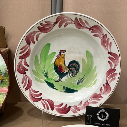 205 - A Set of French Hamage Orchies hand-painted plate, France. Features a colorful rooster and vibrant r... 