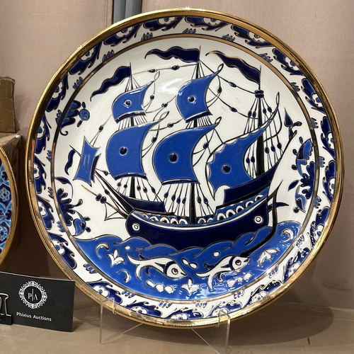 367 - 2 Large Mediterranean Ceramic plates features a blue ship and deer design, accented with floral moti... 