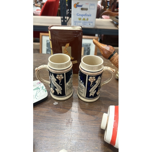 207 - Two vintage ceramic beer steins and an amber glass dish with lid. and a large collection of Antique ... 