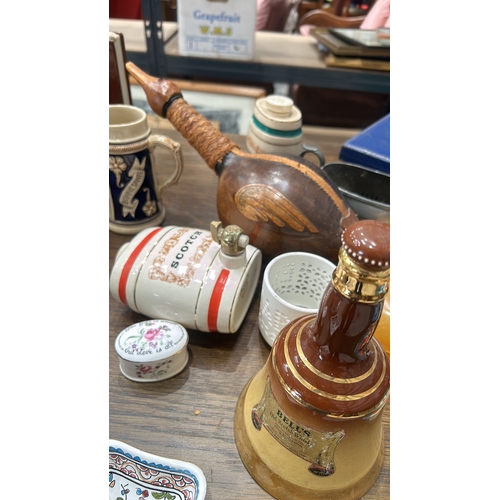 207 - Two vintage ceramic beer steins and an amber glass dish with lid. and a large collection of Antique ... 