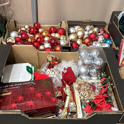 275 - Assorted Christmas decorations, including baubles, ornaments, star lights, and festive floral arrang... 