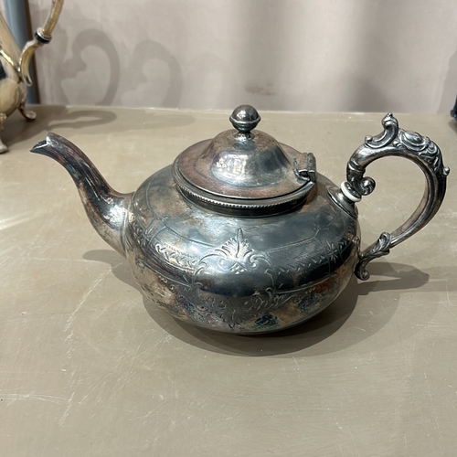 380 - Antique silver plate tea set with ornate detailing, includes various teapots, a sugar bowl, a cream ... 