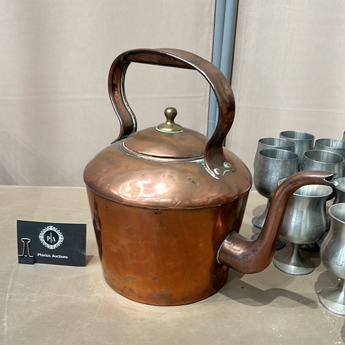 51 - Vintage copper kettle with brass accents, accompanied by a set of Selangor pewter goblets, marked 