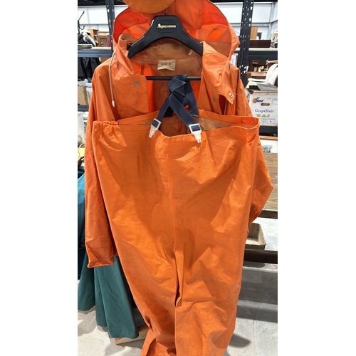 239 - Vintage Helly Hansen PVC waterproof orange rain suit with adjustable suspenders and snap button deta... 