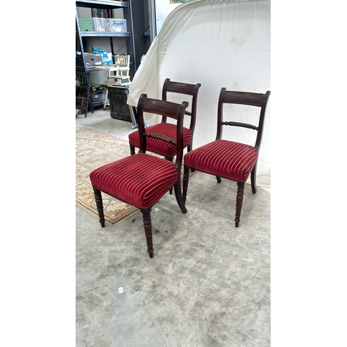 113 - Set of three Regency mahogany dining chairs featuring spiral turned supports and red striped velvet ... 