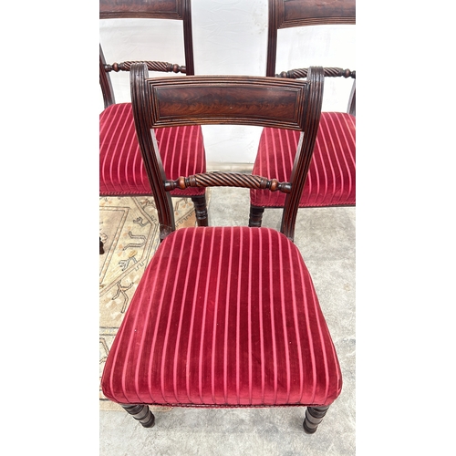 113 - Set of three Regency mahogany dining chairs featuring spiral turned supports and red striped velvet ... 