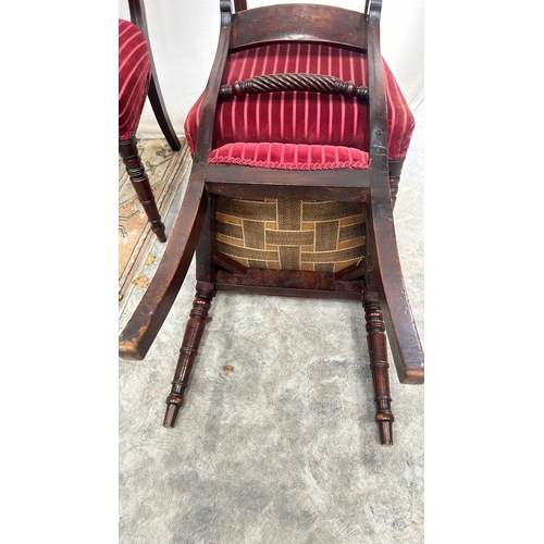 113 - Set of three Regency mahogany dining chairs featuring spiral turned supports and red striped velvet ... 