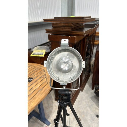 354 - Silver stage spotlight with adjustable tripod, featuring a robust design.