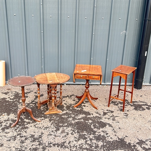 100 - Antique mahogany occasional table with drop leaves and two drawers, featuring a turned pedestal base... 