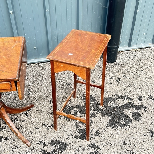 100 - Antique mahogany occasional table with drop leaves and two drawers, featuring a turned pedestal base... 