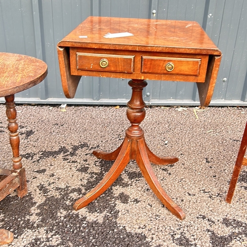 100 - Antique mahogany occasional table with drop leaves and two drawers, featuring a turned pedestal base... 