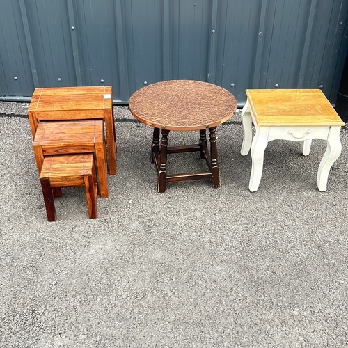 104 - Mixed lot includes a painted side table and drawer, a round copper covered table, and a set of three... 