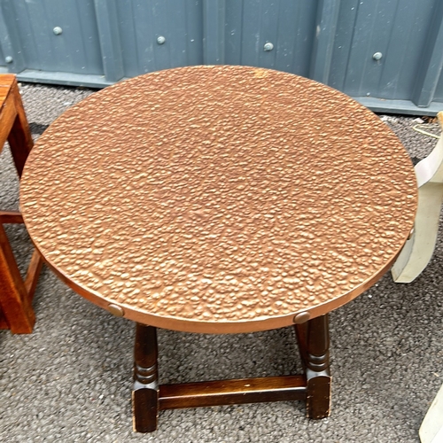 104 - Mixed lot includes a painted side table and drawer, a round copper covered table, and a set of three... 