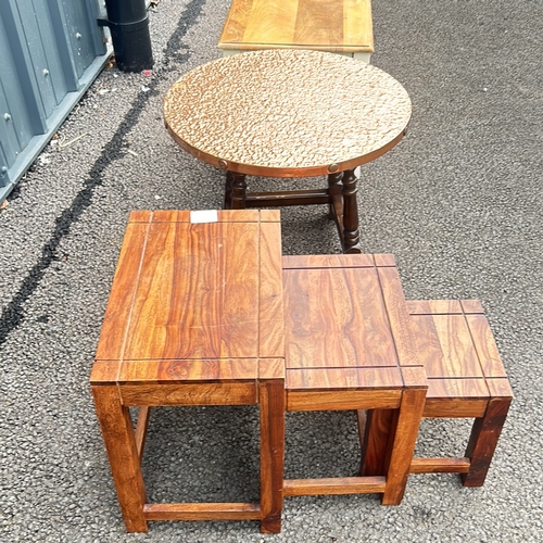 104 - Mixed lot includes a painted side table and drawer, a round copper covered table, and a set of three... 