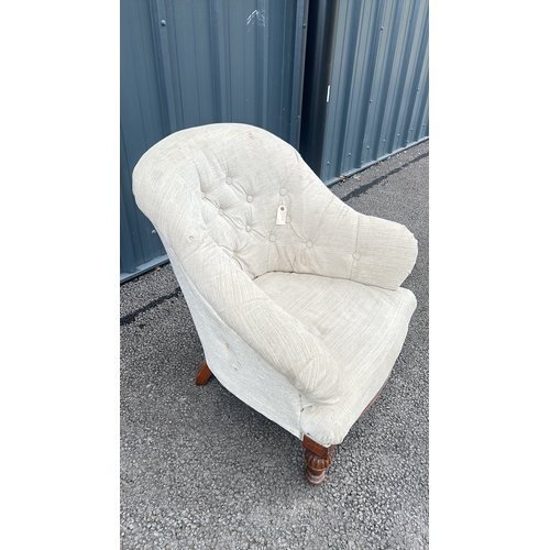 106 - Victorian-style button-tufted chair with carved mahogany legs. Elegant design with plush upholstery.