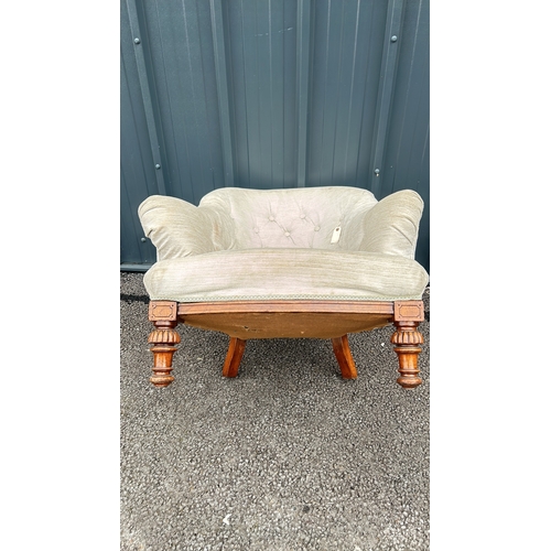 106 - Victorian-style button-tufted chair with carved mahogany legs. Elegant design with plush upholstery.