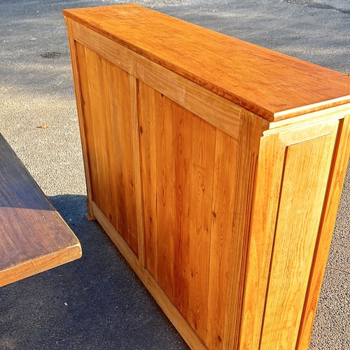 64 - Solid pine bookcase with natural finish, featuring adjustable shelves. Robust construction and class... 