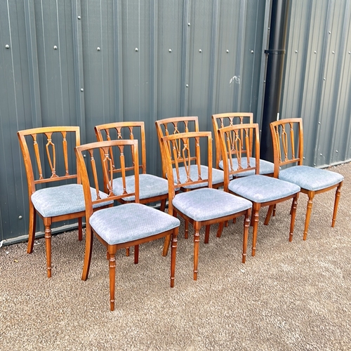 66 - Set of eight mahogany dining chairs with upholstered seats, featuring Georgian-style detailing and t... 