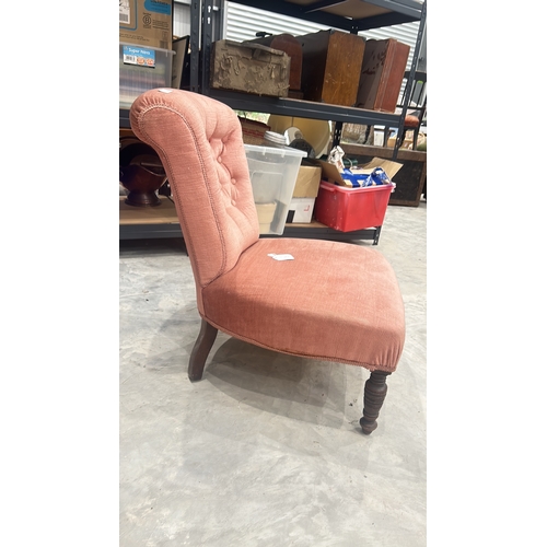 73 - Victorian style upholstered nursing armchair with pink tufted fabric. Features intricately turned wo... 