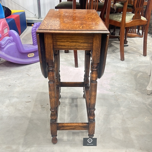 80 - Victorian oak drop-leaf table with turned legs.